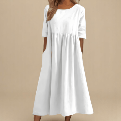 A-line dress for women featuring discreet pockets and made from soft fabric, perfect for everyday comfort and style. 6