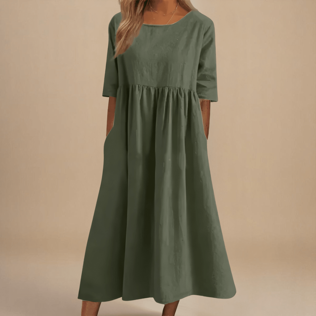 A-line dress for women featuring discreet pockets and made from soft fabric, perfect for everyday comfort and style. 2