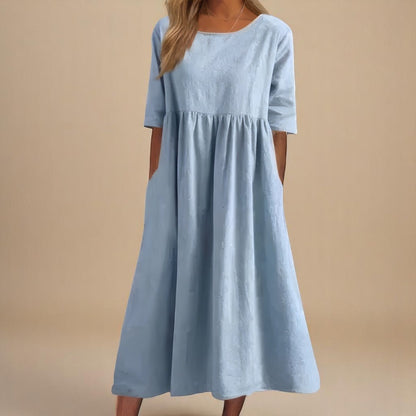 A-line dress for women featuring discreet pockets and made from soft fabric, perfect for everyday comfort and style. 0