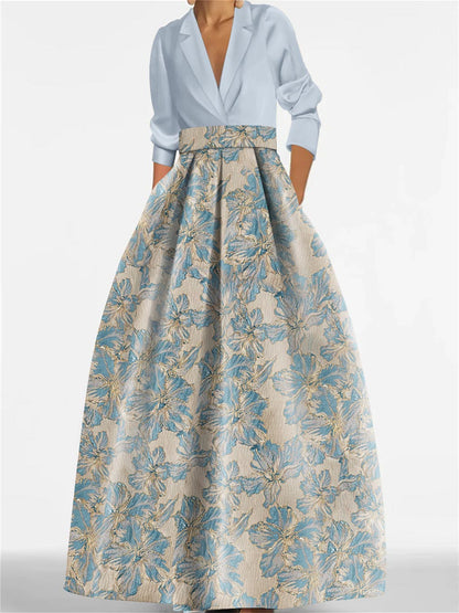 Elegant A-Line Mother of the Bride dress featuring 3/4 sleeves and a delicate floral print, perfect for a stylish wedding ensemble. 1