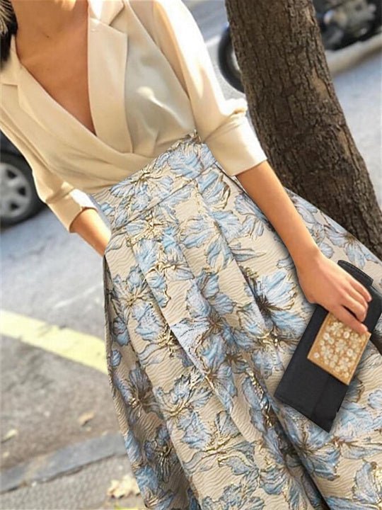 Elegant A-Line Mother of the Bride dress featuring 3/4 sleeves and a delicate floral print, perfect for a stylish wedding ensemble. 4