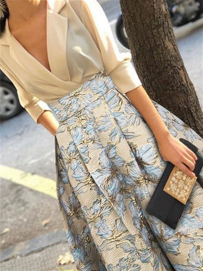 Elegant A-Line Mother of the Bride dress featuring 3/4 sleeves and a delicate floral print, perfect for a stylish wedding ensemble. 4