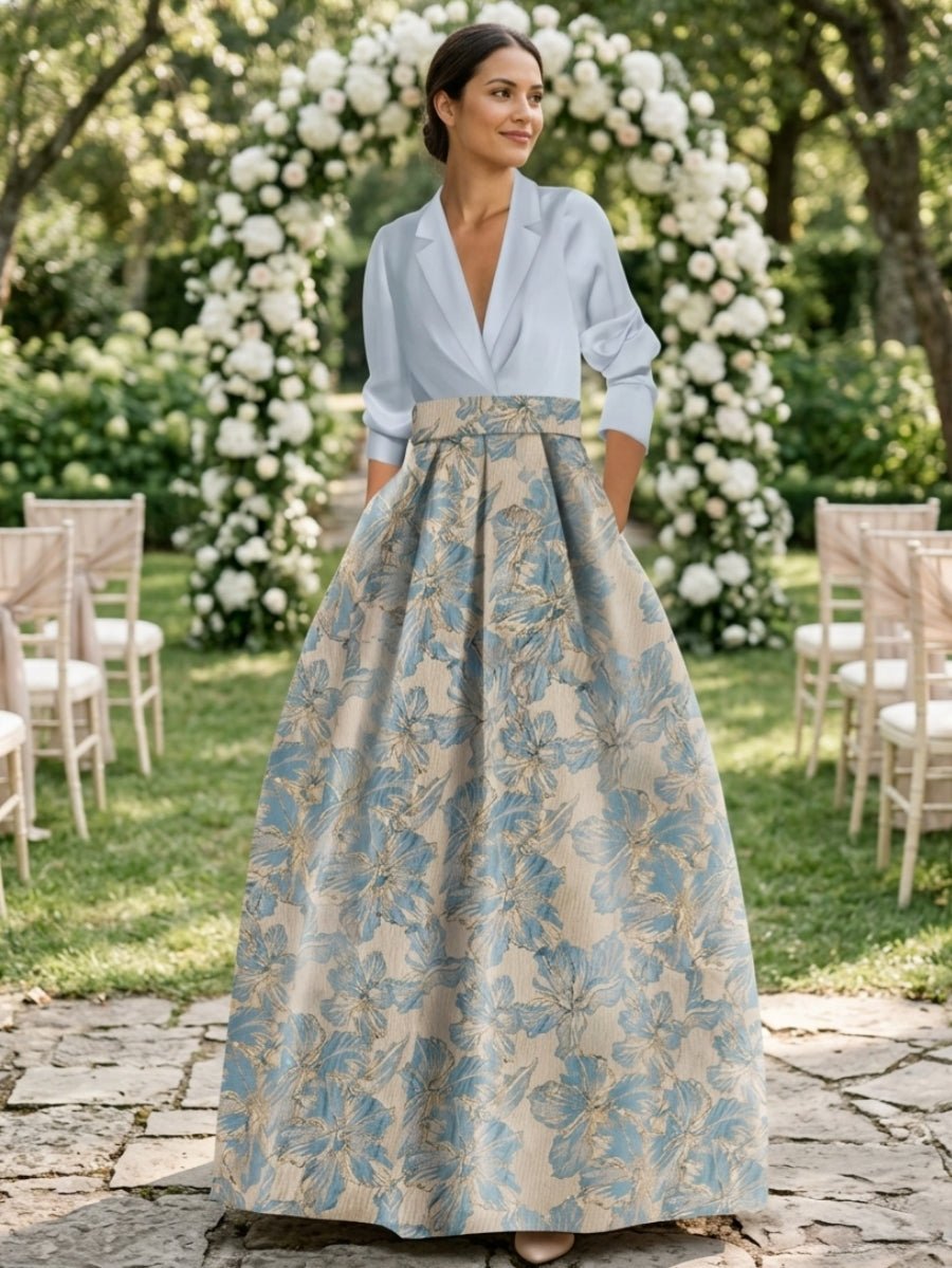 Elegant A-Line Mother of the Bride dress featuring 3/4 sleeves and a delicate floral print, perfect for a stylish wedding ensemble. 3