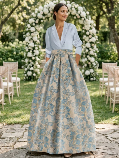 Elegant A-Line Mother of the Bride dress featuring 3/4 sleeves and a delicate floral print, perfect for a stylish wedding ensemble. 3