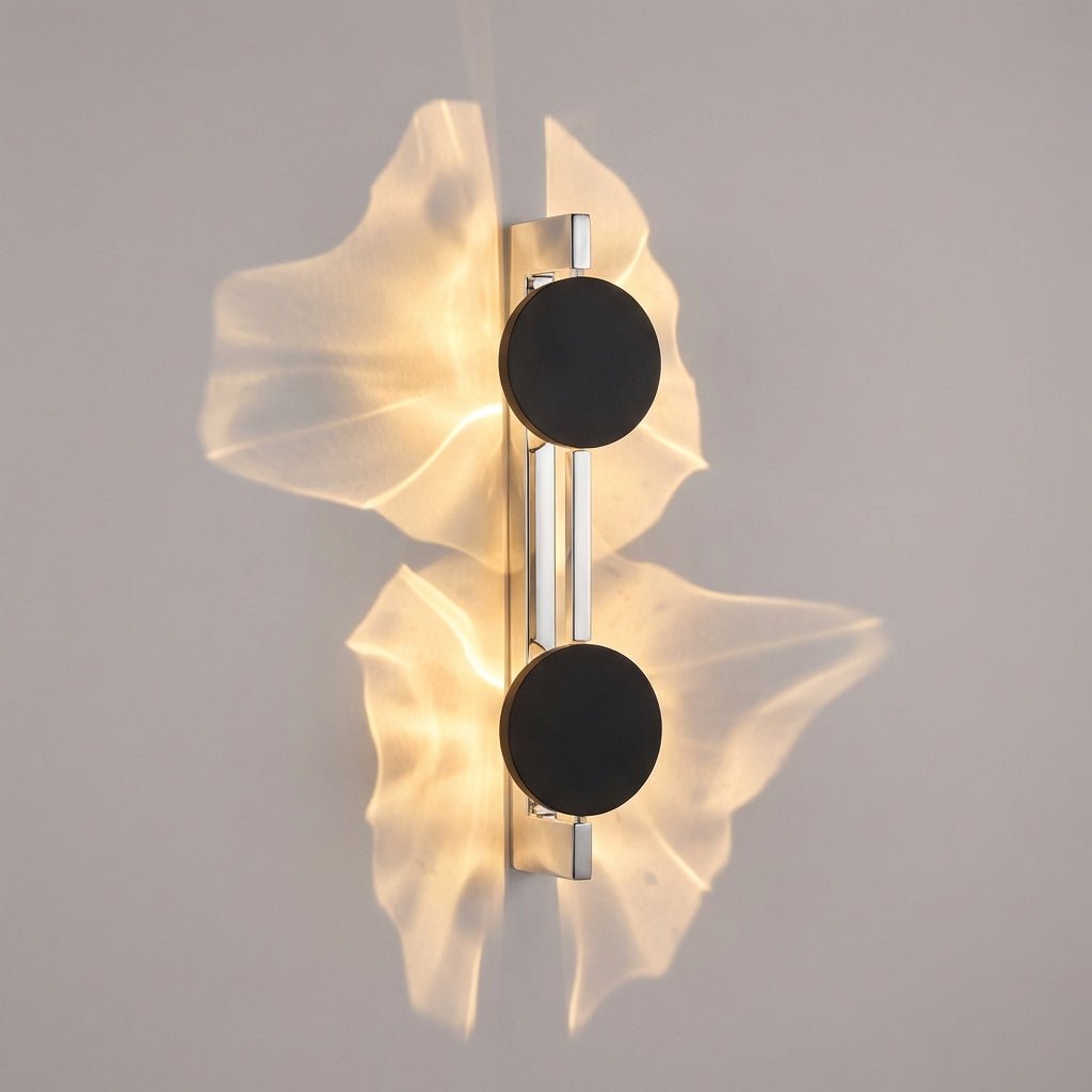 Abstract wall lamp featuring a sculptural metal design and integrated LED lighting, casting unique shadow patterns on the wall. 4