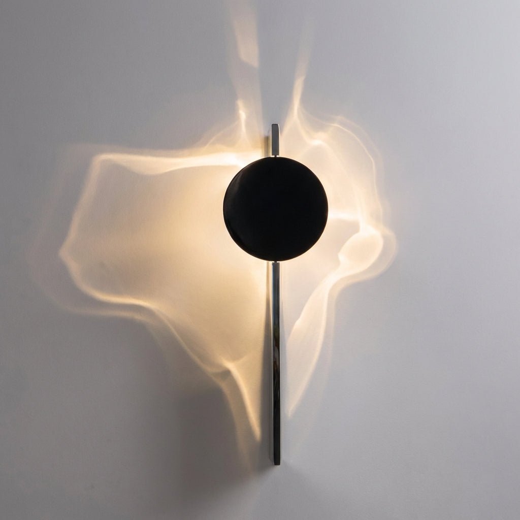 Abstract wall lamp featuring a sculptural metal design and integrated LED lighting, casting unique shadow patterns on the wall. 0