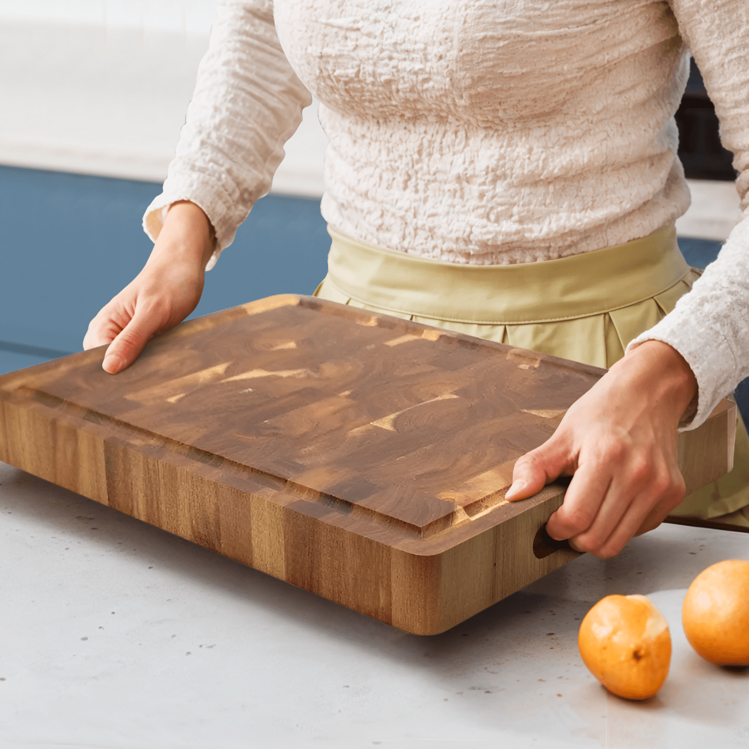 Acacia wood cutting board with a knife-friendly surface, ideal for kitchen prep and durable chopping tasks. 2