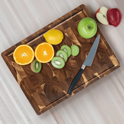 Acacia wood cutting board with a knife-friendly surface, ideal for kitchen prep and durable chopping tasks. 7
