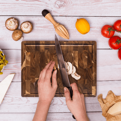 Acacia wood cutting board with a knife-friendly surface, ideal for kitchen prep and durable chopping tasks. 6