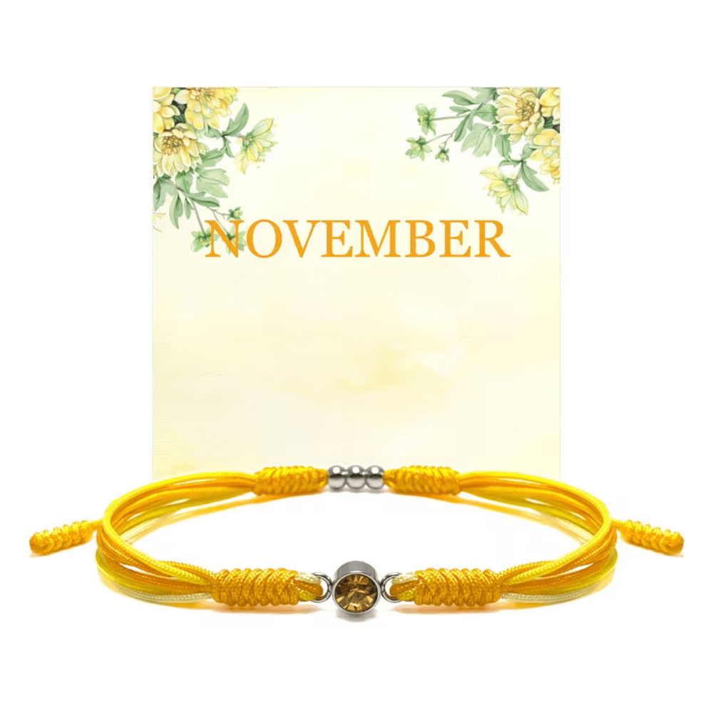Adjustable birthstone bracelet featuring a sliding closure and an elegant rope cord design, perfect for daily wear and personalized style. 11
