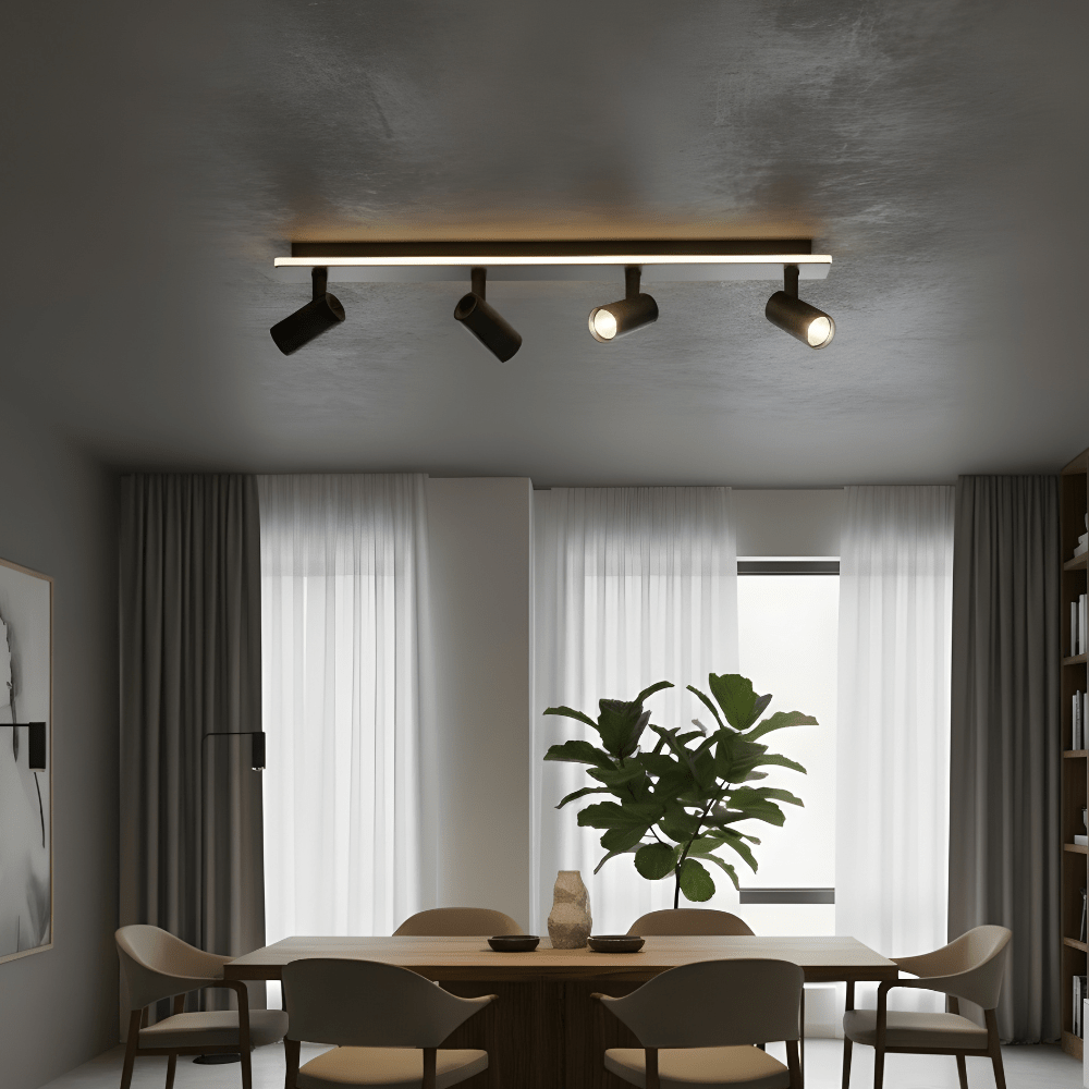 Adjustable LED ceiling lamp featuring a modern industrial design with a sleek metal finish, emitting warm white lighting for a cozy atmosphere. 4