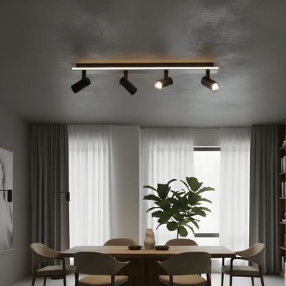 Adjustable LED ceiling lamp featuring a modern industrial design with a sleek metal finish, emitting warm white lighting for a cozy atmosphere. 4