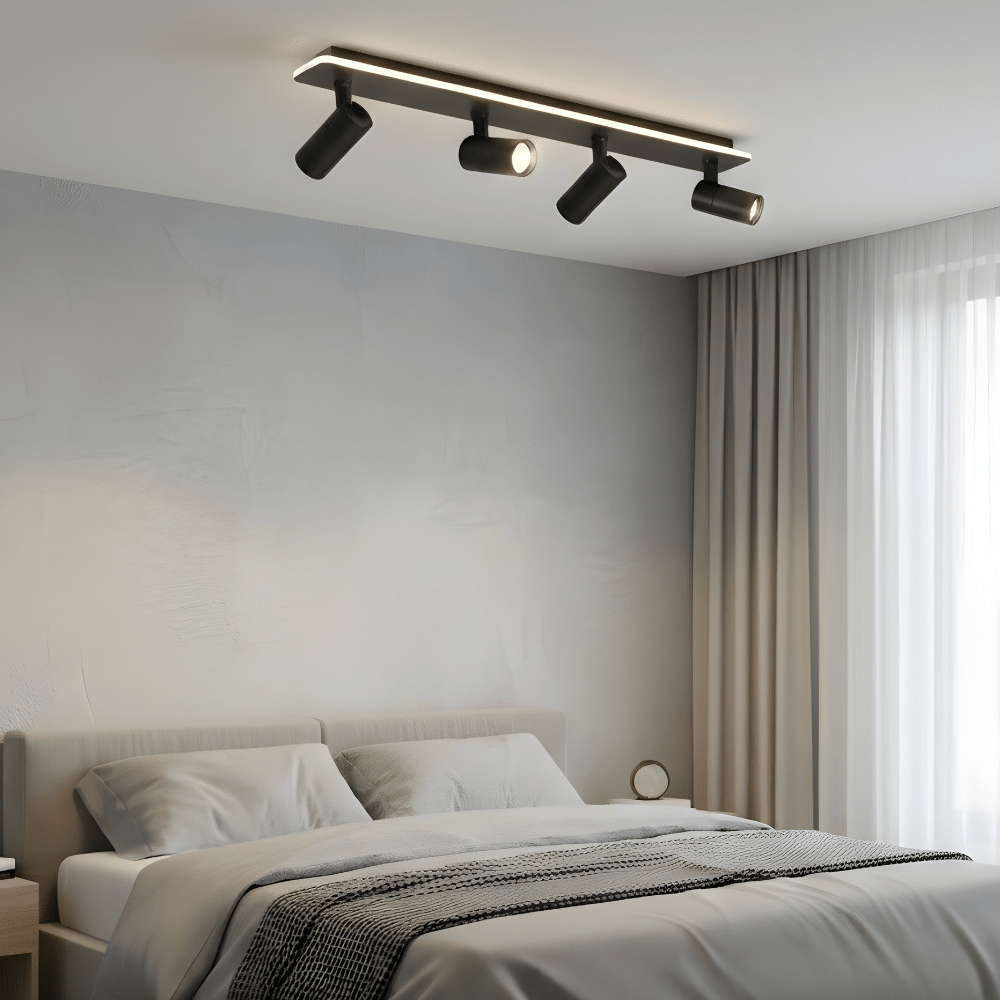 Adjustable LED ceiling lamp featuring a modern industrial design with a sleek metal finish, emitting warm white lighting for a cozy atmosphere. 7
