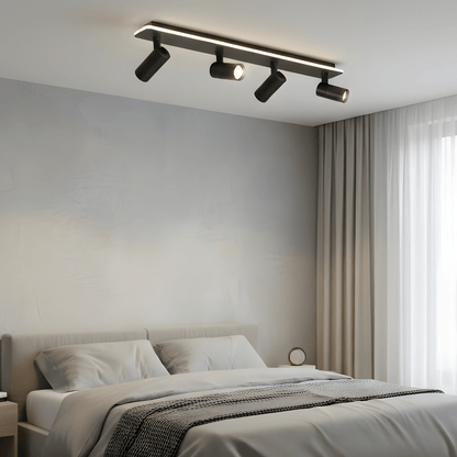 Adjustable LED ceiling lamp featuring a modern industrial design with a sleek metal finish, emitting warm white lighting for a cozy atmosphere. 7
