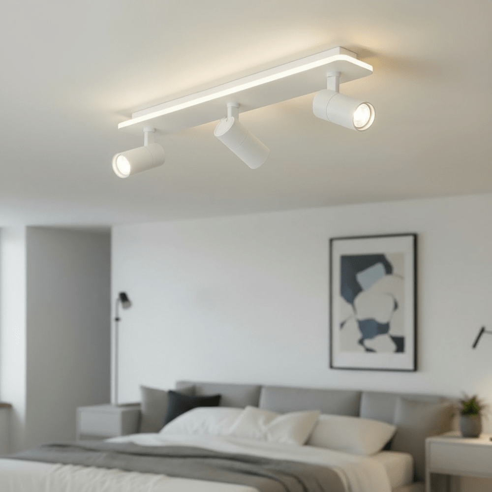 Adjustable LED ceiling lamp featuring a modern industrial design with a sleek metal finish, emitting warm white lighting for a cozy atmosphere. 6