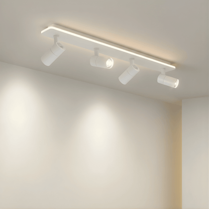 Adjustable LED ceiling lamp featuring a modern industrial design with a sleek metal finish, emitting warm white lighting for a cozy atmosphere. 8