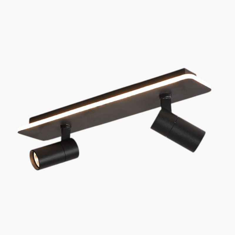 Adjustable LED ceiling lamp featuring a modern industrial design with a sleek metal finish, emitting warm white lighting for a cozy atmosphere. 0