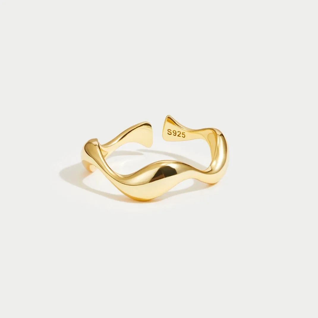 Adjustable minimalist ring in 18K gold plated sterling silver featuring an ocean-inspired design, perfect for elegant and modern jewelry collections. 2