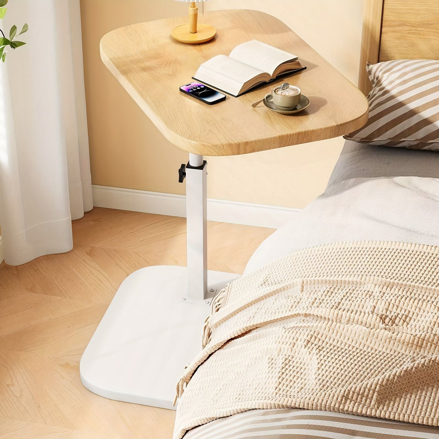 Adjustable side table with a rectangular top and modern metal frame, featuring height adjustability and a space-saving design, perfect for contemporary living spaces. 7