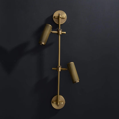 Adjustable wall light with a stylish bronze finish, featuring a durable brass and metal structure, perfect for modern sconces in contemporary home decor. 3