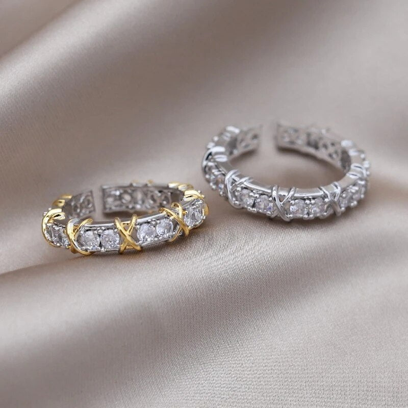 Adjustable wellness ring featuring magnetic zirconia and titanium ion therapy in an elegant gold and silver design, promoting health and style. 4
