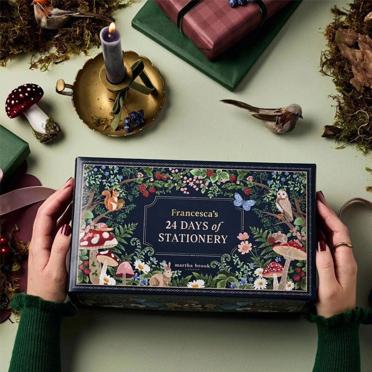 Advent Calendar featuring 24 days of stationery and office supplies, designed with a charming winter forest theme. 1