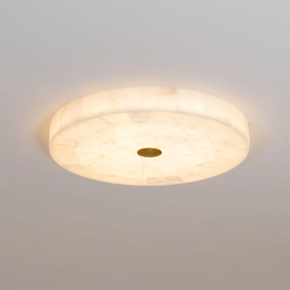 Alabaster flush mount ceiling light featuring a modern design with integrated LED for soft ambient lighting in contemporary interiors. 5
