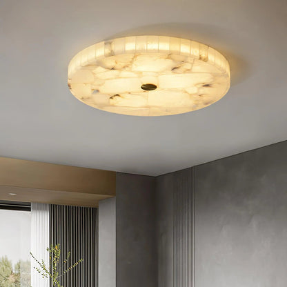 Alabaster flush mount ceiling light featuring a modern design with integrated LED for soft ambient lighting in contemporary interiors. 11