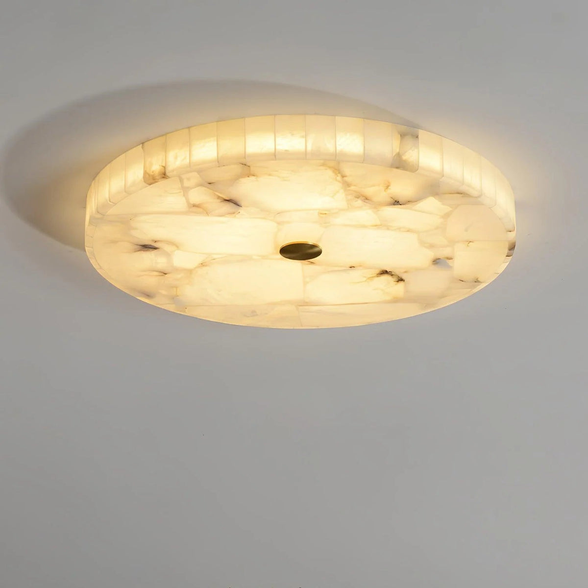Alabaster flush mount ceiling light featuring a modern design with integrated LED for soft ambient lighting in contemporary interiors. 12
