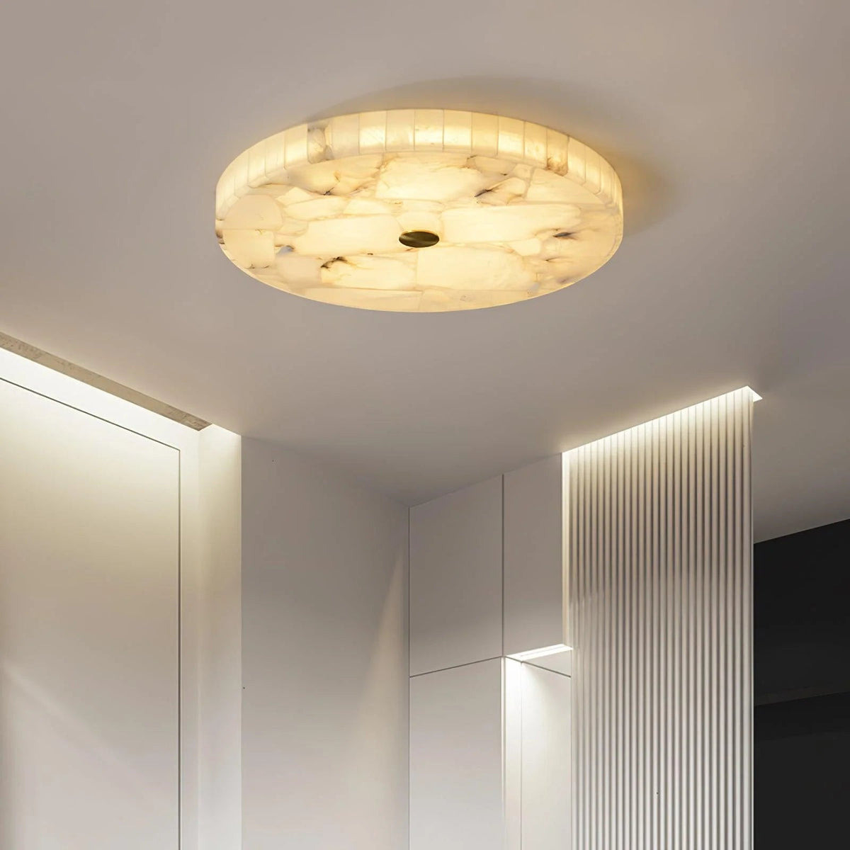 Alabaster flush mount ceiling light featuring a modern design with integrated LED for soft ambient lighting in contemporary interiors. 4
