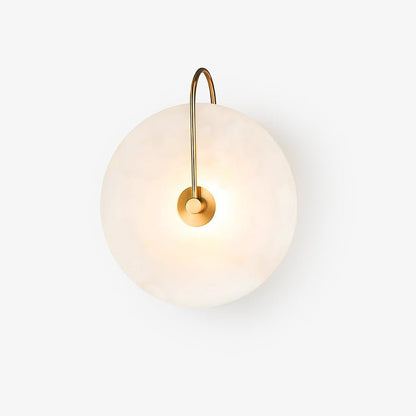 Alabaster wall lamp featuring integrated LED lighting and a unique snowflake pattern, designed with a modern minimalist aesthetic in black metal. 2