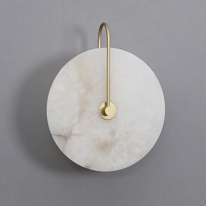 Alabaster wall lamp featuring integrated LED lighting and a unique snowflake pattern, designed with a modern minimalist aesthetic in black metal. 9