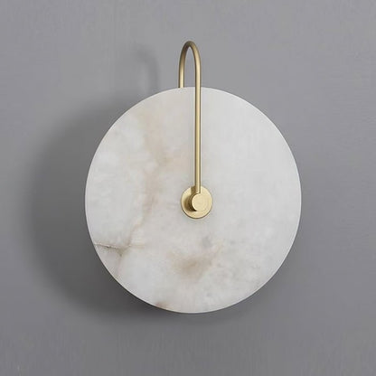 Alabaster wall lamp featuring integrated LED lighting and a unique snowflake pattern, designed with a modern minimalist aesthetic in black metal. 9
