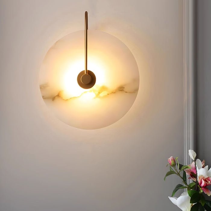 Alabaster wall lamp featuring integrated LED lighting and a unique snowflake pattern, designed with a modern minimalist aesthetic in black metal. 5