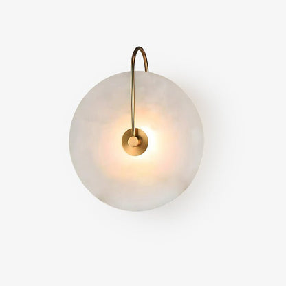 Alabaster wall lamp featuring integrated LED lighting and a unique snowflake pattern, designed with a modern minimalist aesthetic in black metal. 3