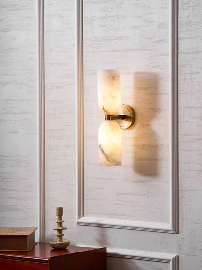 Alabaster wall light featuring an elegant up and down glow design, available in copper, black, or bronze finishes, perfect for modern home decor. 7
