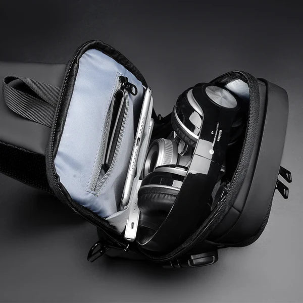 Anti-theft chest bag in black featuring RFID protection and ergonomic design, perfect for secure travel organization. 5