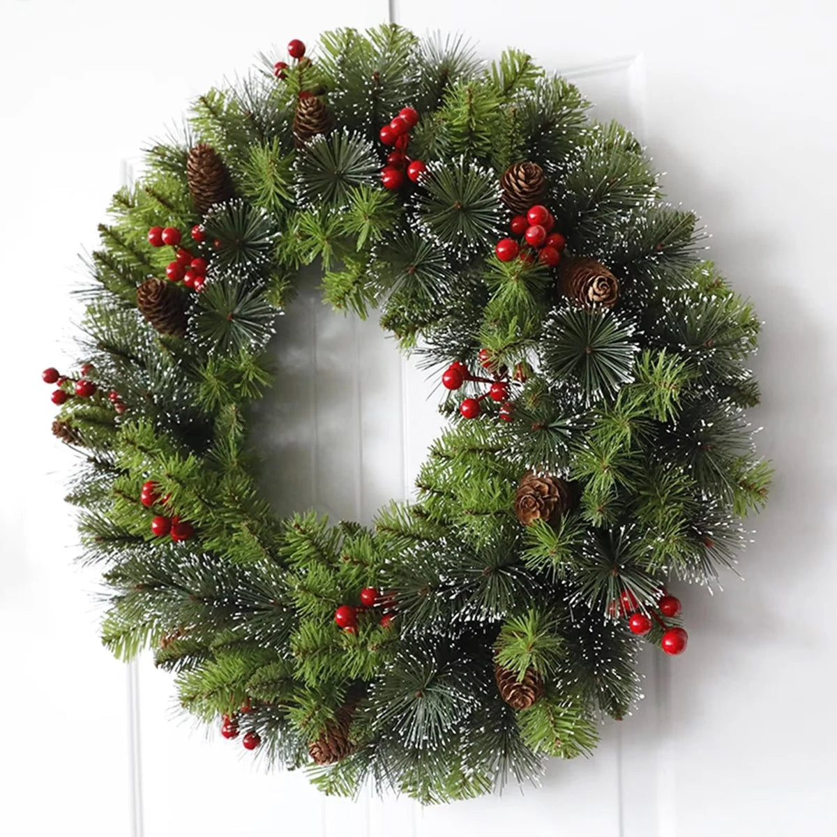 Artificial Christmas wreath featuring a lifelike floral design, perfect for festive home decor; round shape ideal for door displays during the winter season. 3