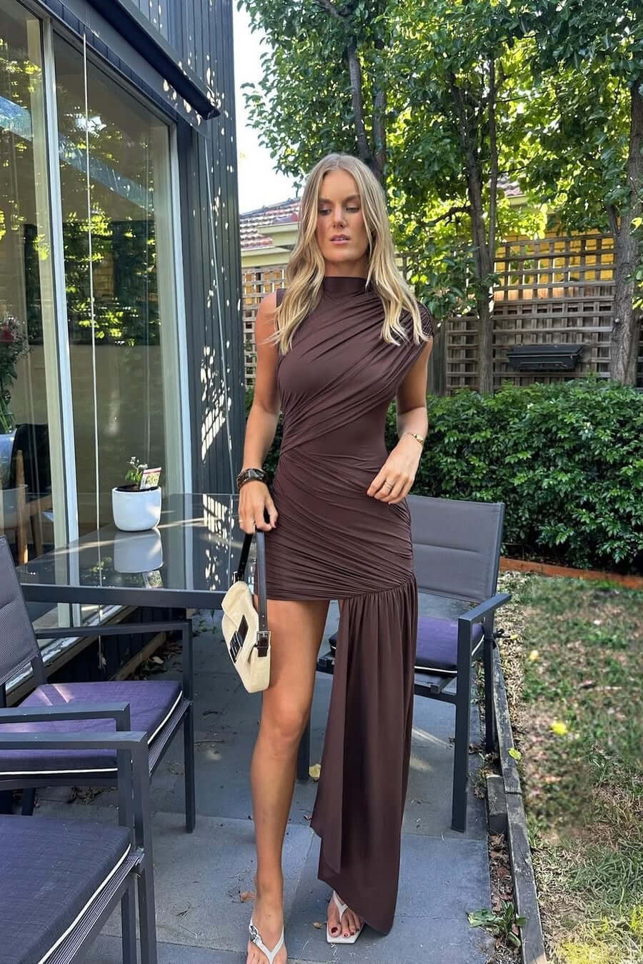 Asymmetric evening dress with cap sleeves and high neckline, perfect for elegant formal weddings, featuring a sophisticated design ideal for wedding guests. 3