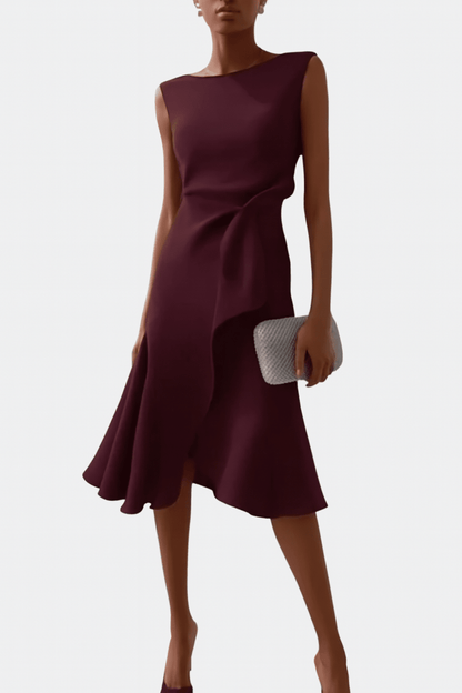Asymmetric midi dress with draped design, featuring elegant sleeveless style, perfect for special occasions and evening wear. 9
