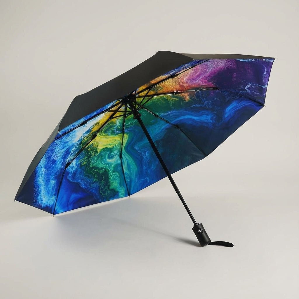 Automatic folding travel umbrella featuring wind-resistant fiberglass ribs, designed for lightweight portability and compact storage, perfect for on-the-go protection from rain and wind. 2