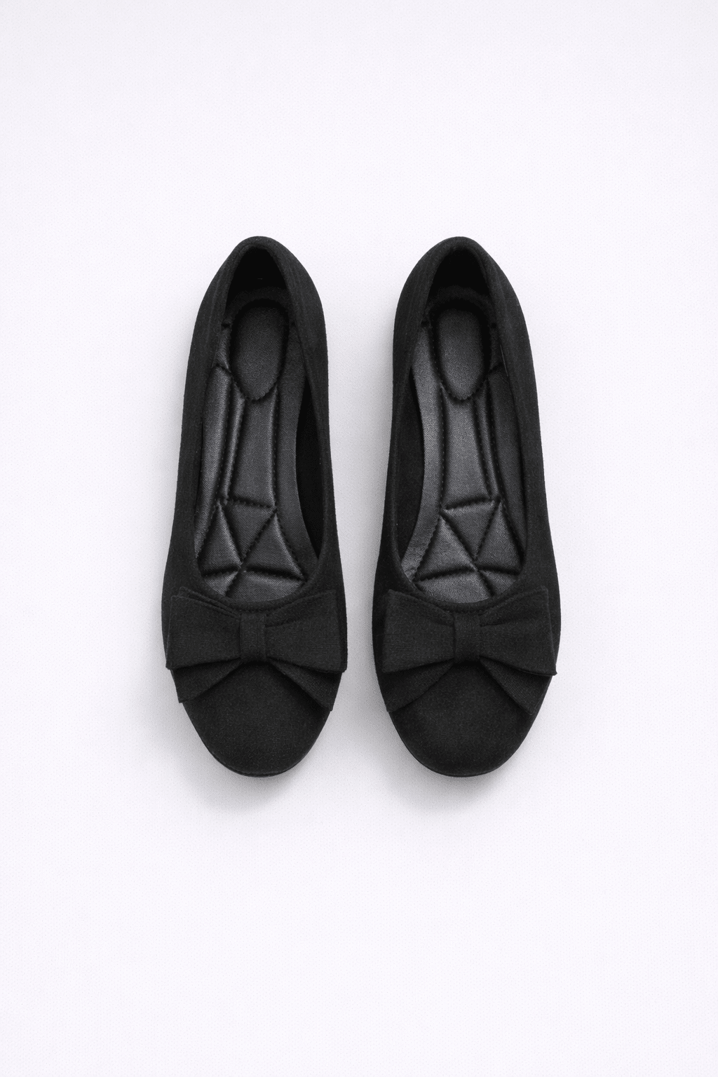 Ballet flats for women featuring a stylish bow detail, comfortable slip-on design, and made from high-quality synthetic leather, perfect for everyday wear. 2