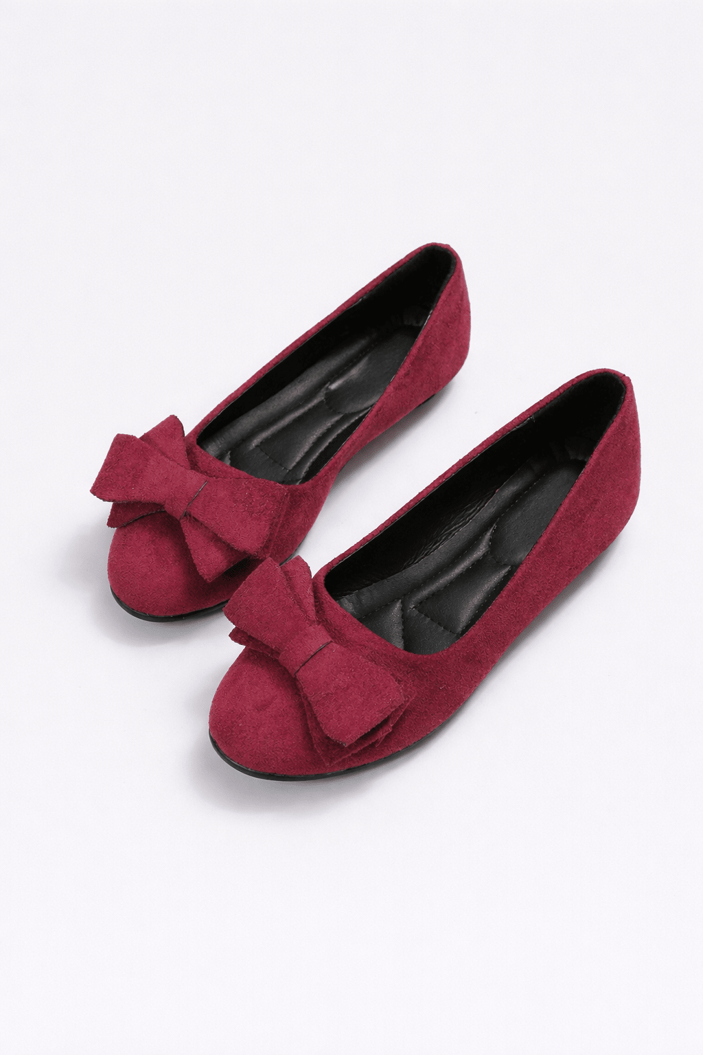Ballet flats for women featuring a stylish bow detail, comfortable slip-on design, and made from high-quality synthetic leather, perfect for everyday wear. 1
