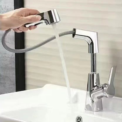 Sleek bathroom faucet with pull-out spray head and 360-degree swivel spout, designed for modern small spaces. 1