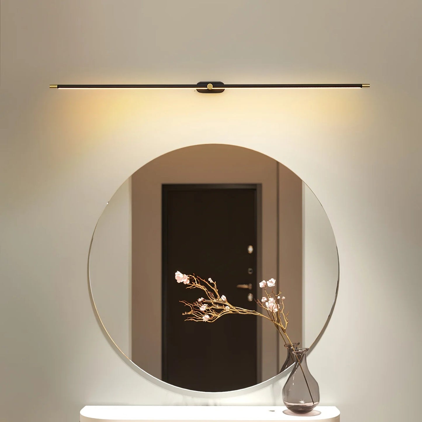 Bathroom wall light featuring a minimalist aluminum design, perfect for above mirror installation, emitting warm white LED lighting for a cozy ambiance. 3