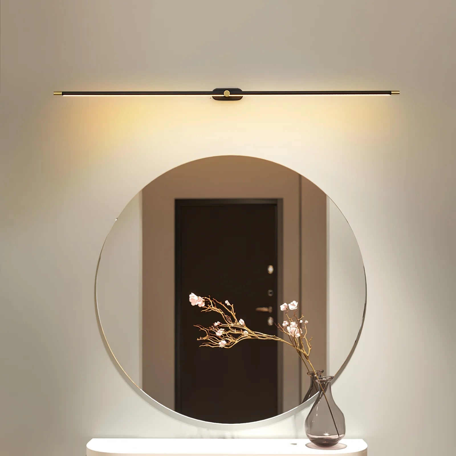 Bathroom wall light featuring a minimalist aluminum design, perfect for above mirror installation, emitting warm white LED lighting for a cozy ambiance. 3
