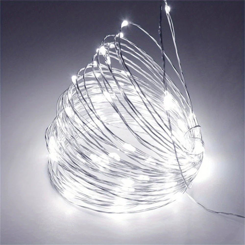 Battery-powered copper fairy lights featuring energy-efficient LED options, available in multiple lengths and colors, perfect for creating a magical ambiance in any space. 3
