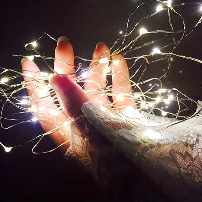 Battery-powered copper fairy lights featuring energy-efficient LED options, available in multiple lengths and colors, perfect for creating a magical ambiance in any space. 4