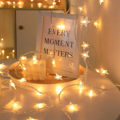 Battery-powered star fairy lights featuring warm white LEDs, available in multiple length options for versatile decorative use. 3