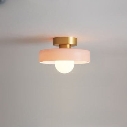Bauhaus ceiling lamp featuring a minimalist design with a spherical glass shade and brass accents, perfect for modern bedroom decor. 11